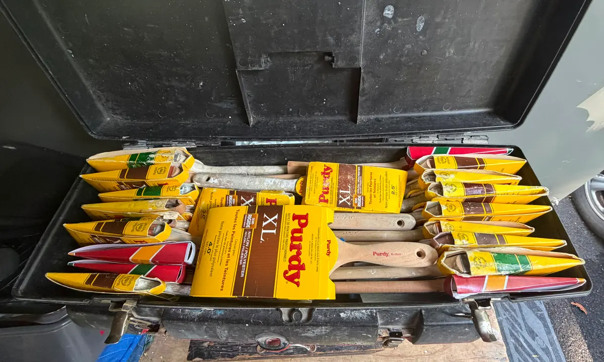 Case of professional Purdy paint brushes