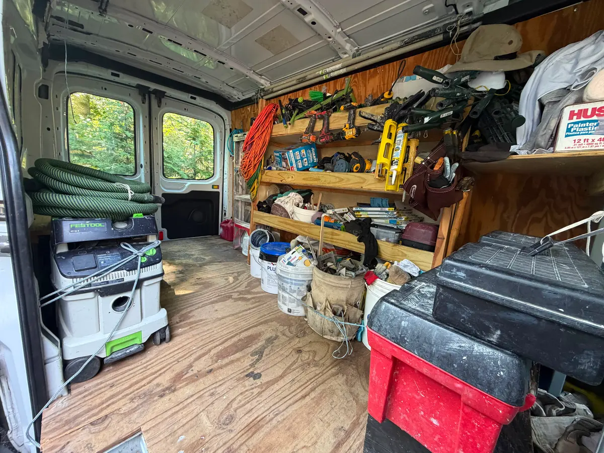 Organized tools and equipment inside the work van